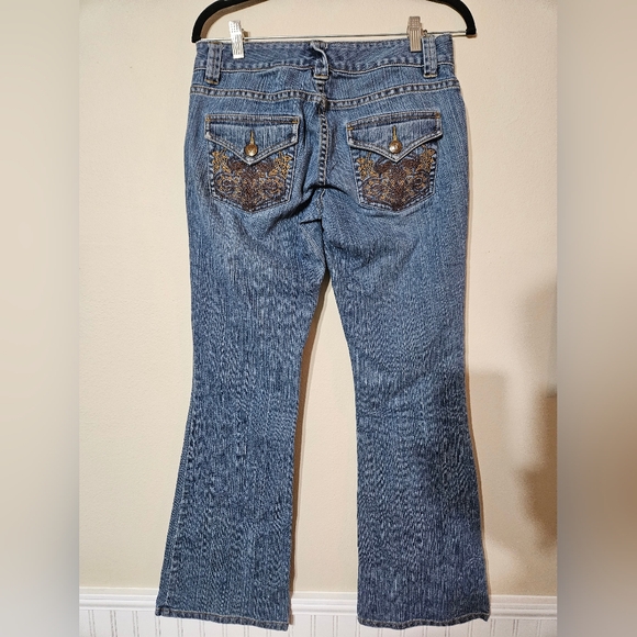 Calvin Klein Low Rise Flare Jeans with Embroidered Pockets - Picture 1 of 6